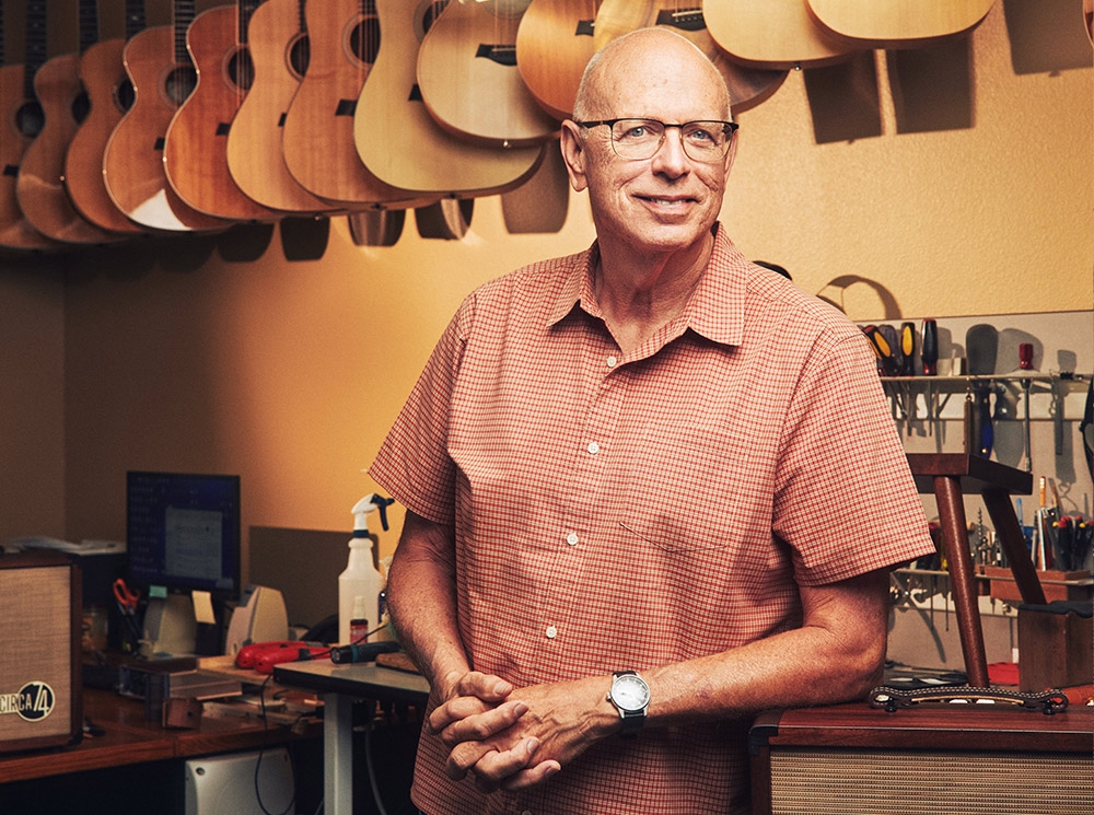 Bob Taylor leaning on a counter looking at the camera