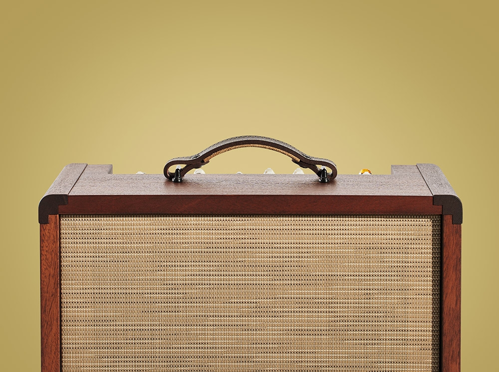 Amp on yellow plain background
