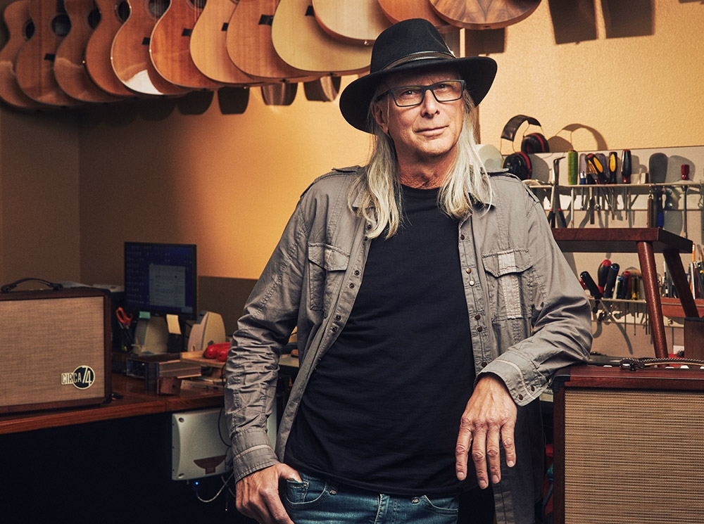 Terry Myers leaning on counter looking into camera